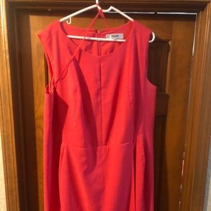 Coral colored woman’s dress